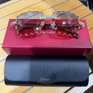 Cartier Women's Sunglasses with Red Lenses and Gold Trim